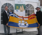 Commodore James presents Alderman Valentine, Lord Mayor of Hobart, with a City of Sydney Flag